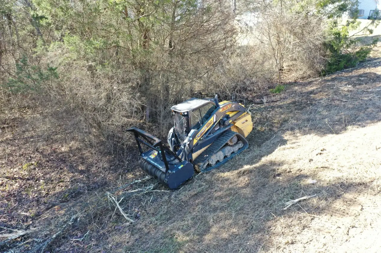 Aerial view of forestry mulcher clearing brush